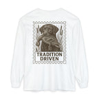 White long-sleeve shirt with a graphic of a dog and duck and 'Tradition Driven' text on a white background