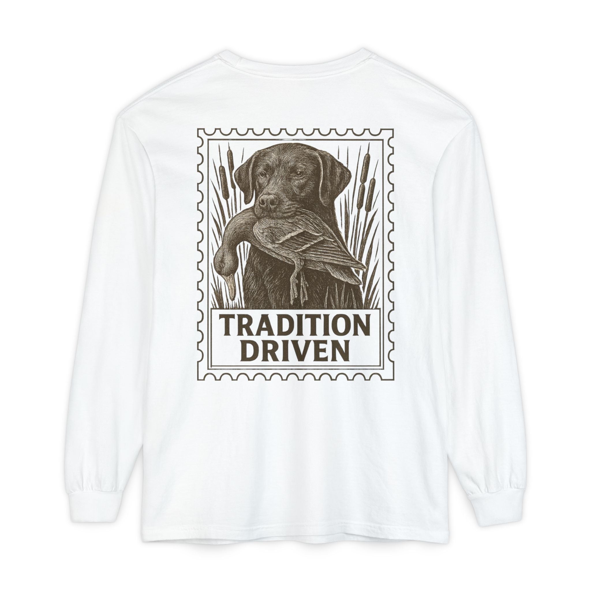 White long-sleeve shirt with a graphic of a dog and duck and 'Tradition Driven' text on a white background